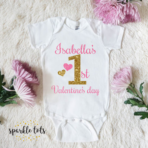 1st Valentine's Day onesie featuring a heartwarming design. Personalise with your baby's name for an extra special touch. Available in various sizes for maximum comfort.