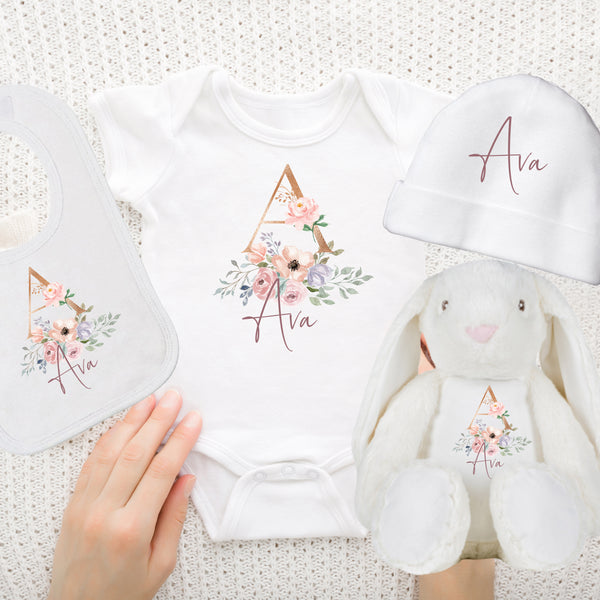 "Adorable Baby Girl Gift Set with Personalised Baby Grow. Options include Hat, Teddy, Bib, or the complete set. Crafted for newborn comfort and style."  Feel free to customize these as needed to match your brand tone and style. If you have specific keywords or details you'd like to include, feel free to let me know!