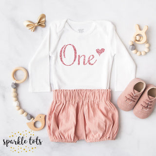 Chic Rose Gold 1st Birthday Vest from Sparkle Tots – a stylish and adorable piece featuring a charming rose gold '1' for your little one's special celebration.