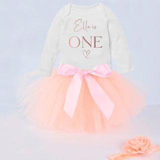 Adorable 1st Birthday Outfit in Peach from Sparkle Tots – customizable with long or short sleeve options, and the choice of vest only or a full set with a peach tutu and hair bow for your baby girl's special celebration.