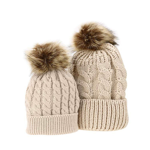 Mother and daughter matching faux fur pom pom hats
