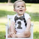 Adorable Baby Boy's 1st Birthday Grey Bodysuit, perfect for the special celebration. Crafted for cuteness and comfort, available in various sizes for a snug fit. Dress your little one in style for the big day!